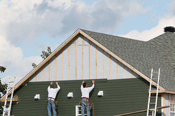 Professional Siding Contractor technician working in Conroe, TX